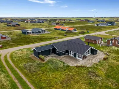 an overhead view of a farm with a house at Holiday Home Sochyeta - 150m from the sea by Interhome in Harboør