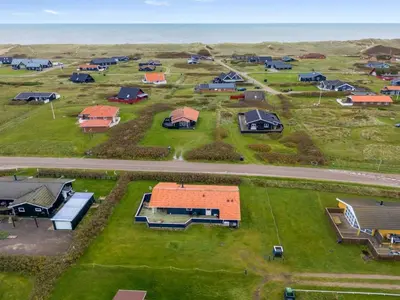an aerial view of a group of houses at Holiday Home Odmar - 300m from the sea by Interhome in Harboør