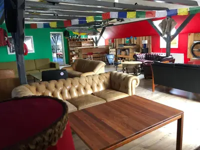 a living room with a couch and a table at La Ola in Hanstholm