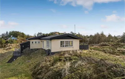 a house on top of a hill at Awesome Home In Fjerritslev With Wifi in Fjerritslev