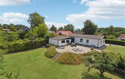 an aerial view of a house with a yard at Cozy Home In Nykøbing M With Wifi in Refshammer
