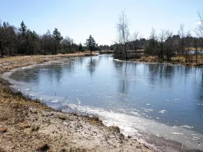 a river with ice on the sides of it at 6 person holiday home in Vemb-By Traum in Vemb