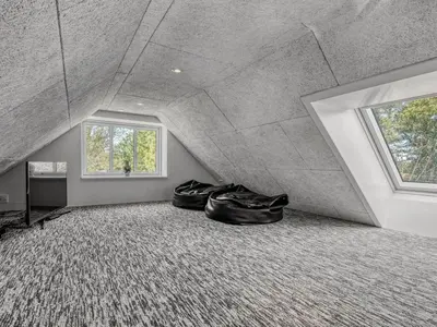 a room with two pairs of shoes sitting on the floor at Holiday Home Elisa - 1-2km from the sea by Interhome in Bedsted Thy