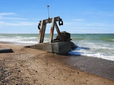 a structure on the beach near the ocean at Holiday Home Elsia - 1-5km to the fjord by Interhome in Frøstrup