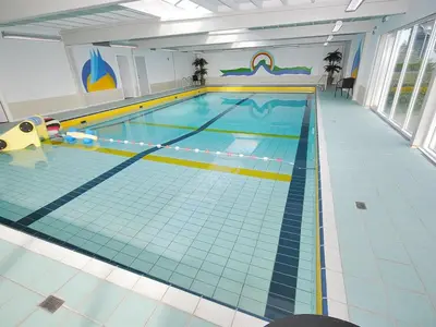 a large swimming pool in a gymnasium at Apartment Dineke - 200m to the fjord by Interhome in Vestervig