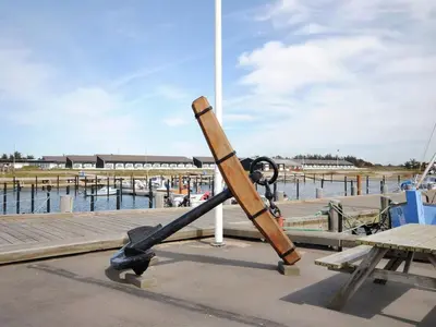 a large baseball bat sitting on top of a dock at Apartment Dineke - 200m to the fjord by Interhome in Vestervig