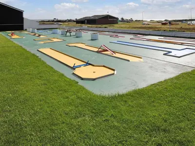 a row of trays on a field of grass at Apartment Benta - 150m to the fjord by Interhome in Vestervig