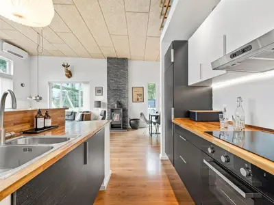 a kitchen with a sink and a counter at Holiday Home Tenna - 250m to the fjord by Interhome in Højslev