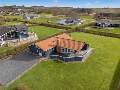 an overhead view of a house with a yard at Holiday Home Loviisa - 300m to the fjord by Interhome in Vinderup