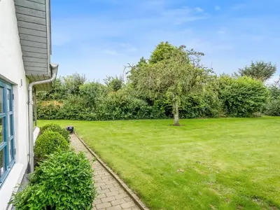 a view of a yard from a house at Holiday Home Aliza - 300m to the fjord by Interhome in Roslev