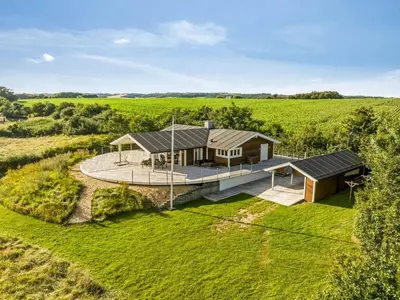 an aerial view of a house in the middle of a field at Holiday Home Eljas - 200m to the fjord by Interhome in Fur