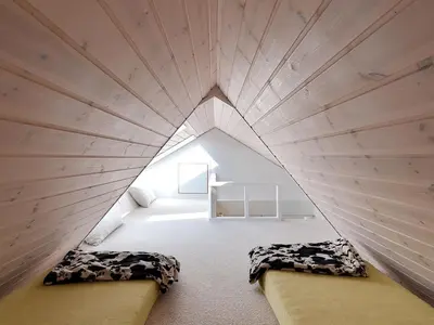 a room with two beds in a tiny house at Holiday Home Ara - 700m from the sea by Interhome in Pandrup