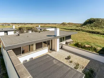 an aerial view of a house with a roof at Holiday Home Ingomar - 300m from the sea by Interhome in Pandrup