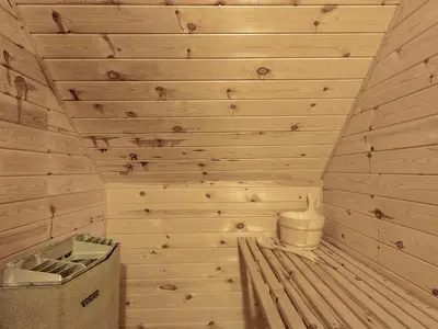 a wooden room with a toilet in a room at Holiday Home Tally - 800m to the fjord by Interhome in Løgsted