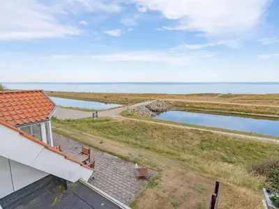 an aerial view of the ocean from a house at Holiday Home Yorrick - 50m to the fjord by Interhome in Løgstør
