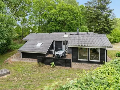 an aerial view of a small black house at Holiday Home Magh by Interhome in Års