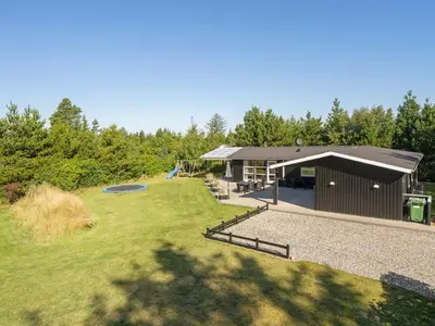 an aerial view of a building with a playground at Holiday Home Wilja - 400m from the sea by Interhome in Fjerritslev