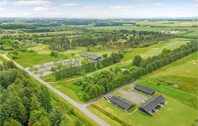 an aerial view of a farm with houses and trees at Lovely Home In Pandrup With Kitchen in Pandrup