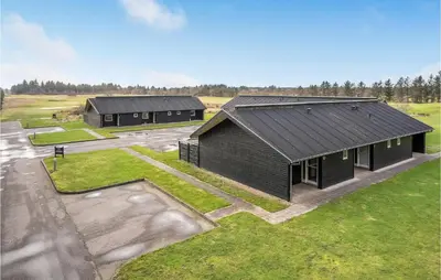 an overhead view of two buildings in a field at Lovely Home In Pandrup With Kitchen in Pandrup