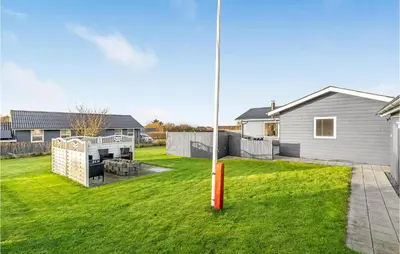a view of a yard with a house at Amazing Home In Vinderup With Wifi in Vinderup