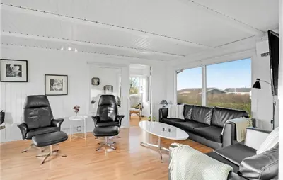 a living room with a couch and chairs and a table at Amazing Home In Vinderup With Wifi in Vinderup