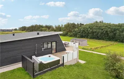 an overhead view of a black house with a pool at Beautiful Home In Spøttrup With Wifi in Spottrup