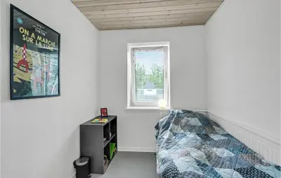 a white room with a bed and a window at Gorgeous Home In Vestervig With Wifi in Vestervig