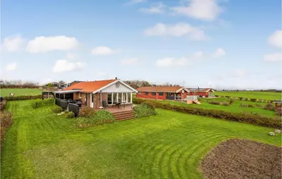 an aerial view of a house in a field at Cozy Home In Hurup Thy With Wifi in Doverodde
