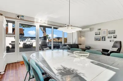 a dining room with a table and chairs at Beautiful Home In Pandrup With 2 Bedrooms And Wifi in Pandrup