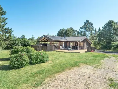 a home with a large yard with a house at Holiday Home Kali - 900m to the fjord by Interhome in Løgstør