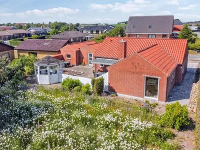 an aerial view of a house with a garden at Holiday Home Kiersten - 5km from the sea by Interhome in Saltum