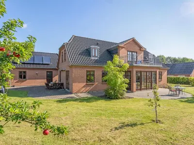 an image of a house with a yard at Holiday Home Iarund - 500m to the fjord by Interhome in Løgstør